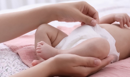 Nappy changing on a baby in a public washroom