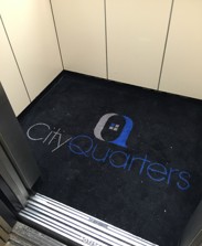 City Quarters Lift Fitted Logo Mat.jpg